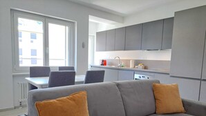 Business Condo | Living area | 32-inch flat-screen TV with satellite channels - Urban Apartments  (Lugano)
