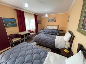 Standard Quadruple Room, 1 Bedroom, Non Smoking, Annex Building | Desk, blackout drapes, free WiFi, bed sheets