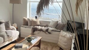 Living area - Orkney Retreats Kilnbarn 5* Scandi Deluxe Seafront Cottage (Kilnbarn)