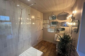 Shower, hair dryer, towels, soap
