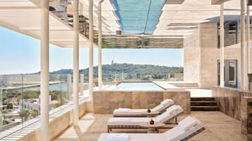 Seasonal outdoor pool, free pool cabanas, pool umbrellas
