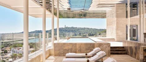 Seasonal outdoor pool, free pool cabanas, pool umbrellas