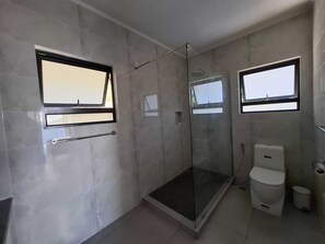 Apartment, Sea View | Bathroom | Shower, towels, toilet paper