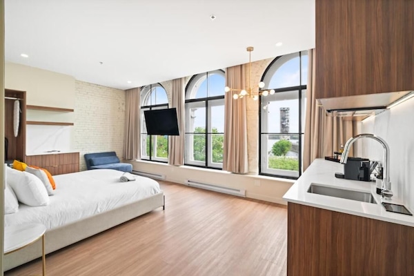 Premium Room, Partial Lake View | In-room safe, desk, laptop workspace, iron/ironing board
