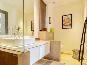 Shower, towels, toilet paper