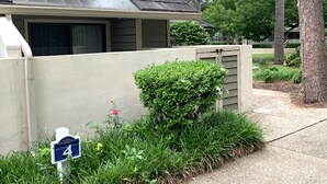 A residential house with a sloped roof, a mailbox, and a gated driveway. - Beach Retreat 3BR Ground Floor Condo in Kingston Plantation! (Myrtle Beach)