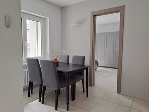 Standard Apartment, Balcony | Living area | 32-inch flat-screen TV with satellite channels - Urban Residence Apartments with parking  (Lugano)