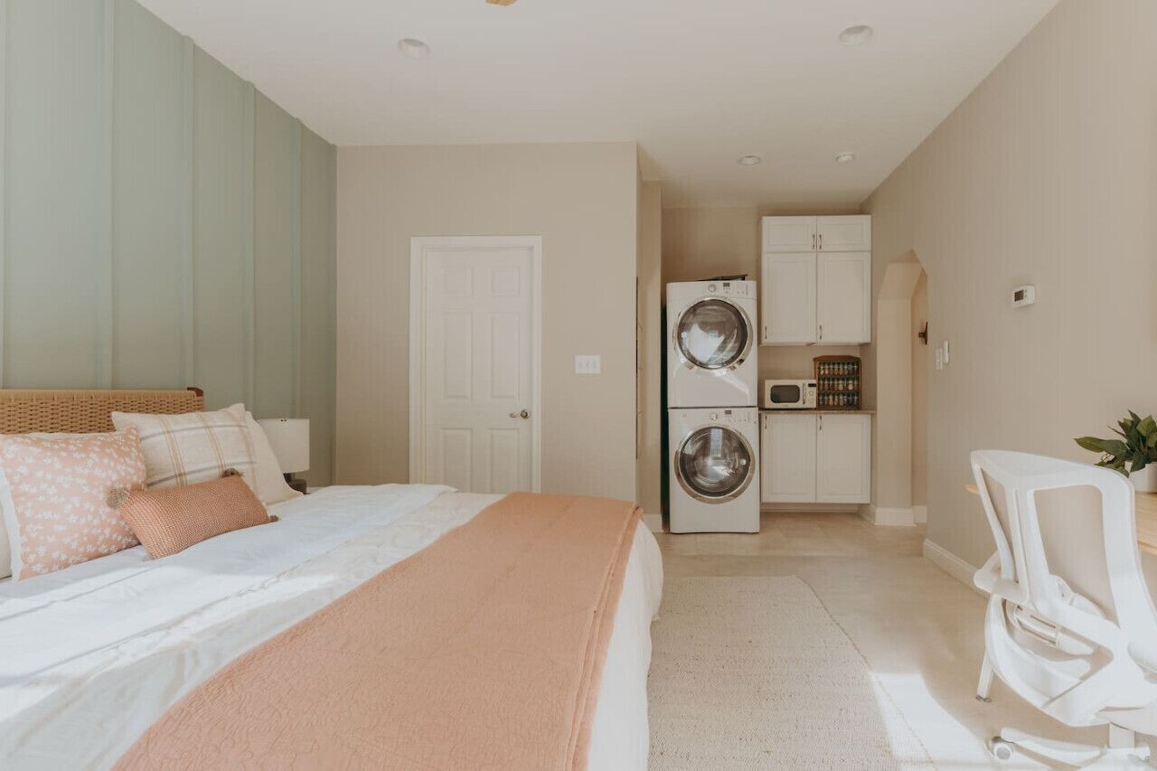 1 bedroom, desk, iron/ironing board, travel crib