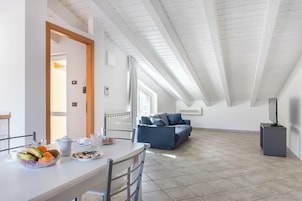 Superior Apartment, 2 Bedrooms, City View | Living area | TV