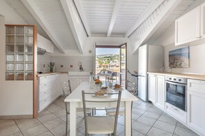 Superior Apartment, 2 Bedrooms, City View | Private kitchenette | Fridge, oven, highchair, cookware/dishes/utensils