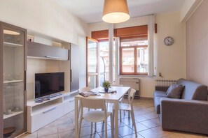 Classic Apartment, 1 Bedroom, City View | Living area | TV
