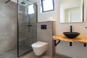 Villa | Bathroom | Shower, towels, soap, toilet paper