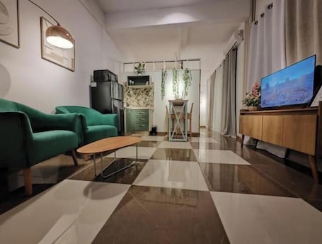 Living area. New, Exclusive, Central, Shoppings 3 min. away. CATARATAS just 30 Km away