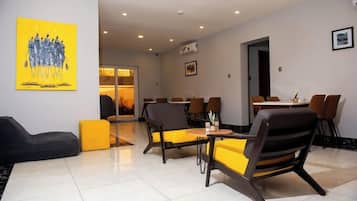 Family Room, Balcony, City View | Living area | TV
