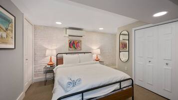 2 bedrooms, desk, iron/ironing board, travel crib