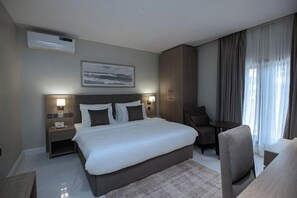 Economy Room, Balcony, City View | Desk, laptop workspace, free WiFi - Knightsbridge Hotel and Suites  (Abuja)