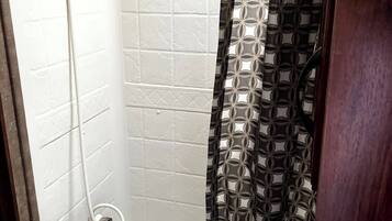 Shower, towels, toilet paper