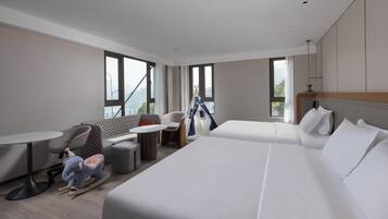 1 King and 1 Double Standard River View | Premium bedding, down duvets, desk, laptop workspace