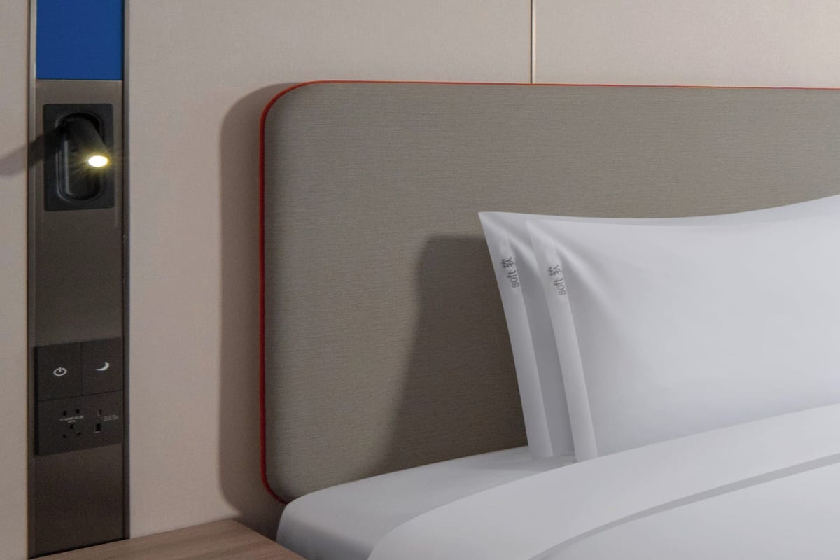 Premium bedding, down duvets, desk, laptop workspace