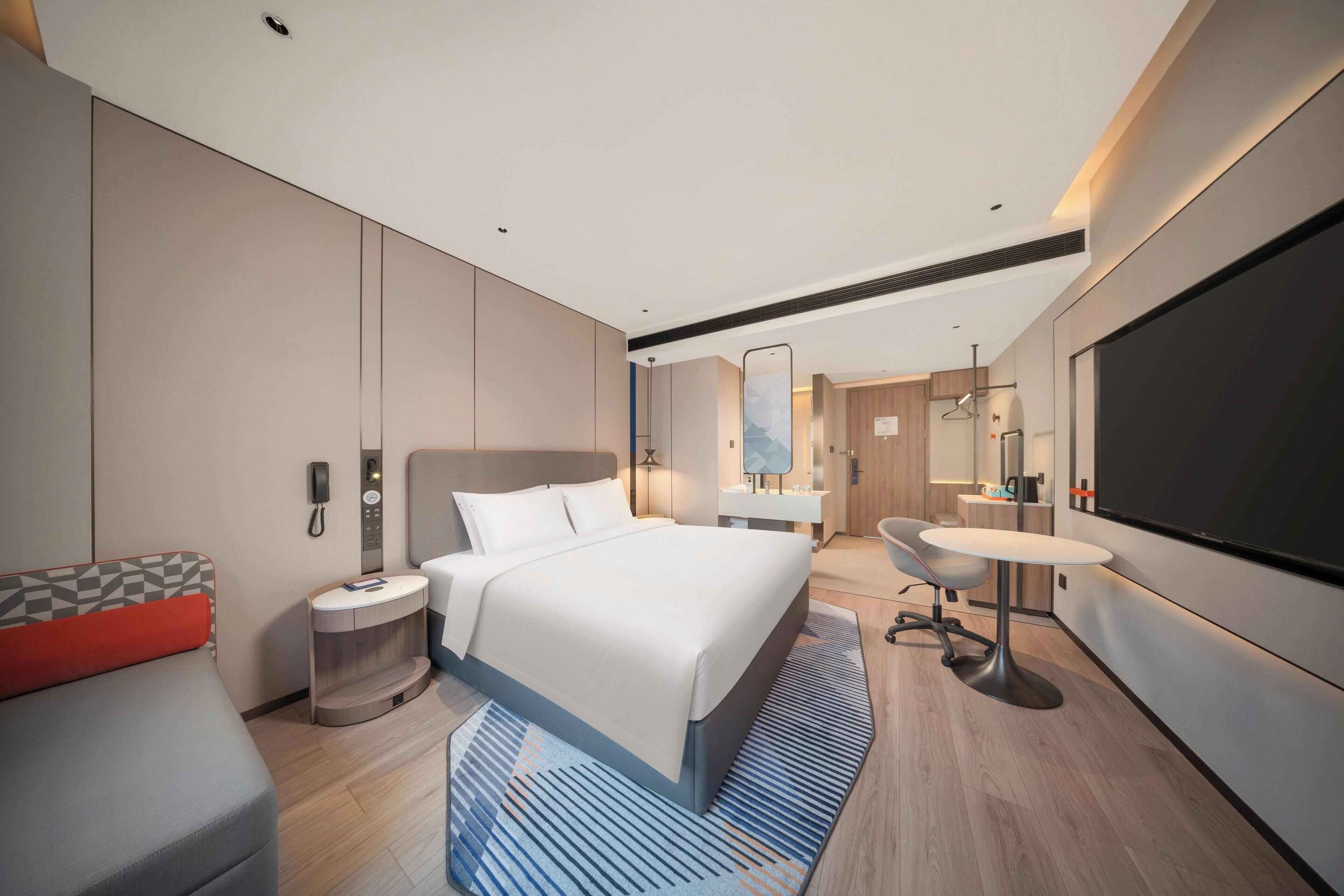 Premium bedding, down comforters, desk, laptop workspace