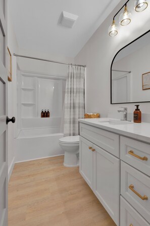 Hair dryer, towels, soap, shampoo