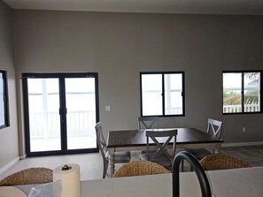 Dining - Modern 3-bedroom waterfront lagoon house with Wi-Fi, AC in beautiful Maya Beach. (Placencia)
