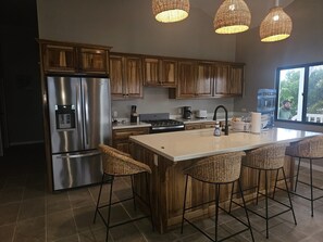 Private kitchen - Modern 3-bedroom waterfront lagoon house with Wi-Fi, AC in beautiful Maya Beach. (Placencia)