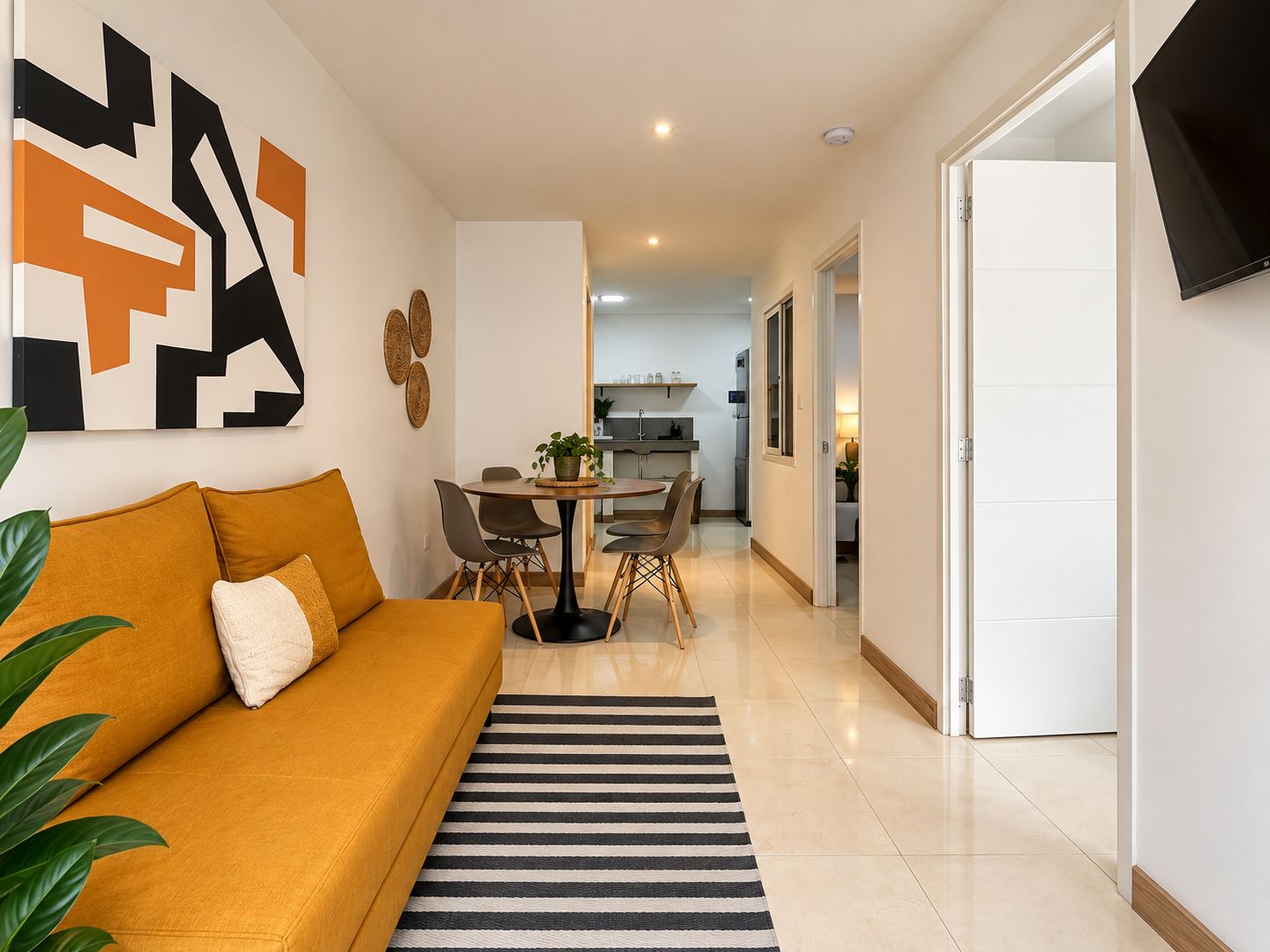 Comfort Studio Suite, 2 Bedrooms | Living area | TV