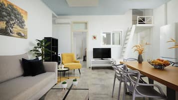 Family Apartment, 2 Bedrooms, Ocean View, Beachfront | Laptop workspace, soundproofing, iron/ironing board, free WiFi