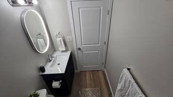 Hair dryer, towels, soap, shampoo