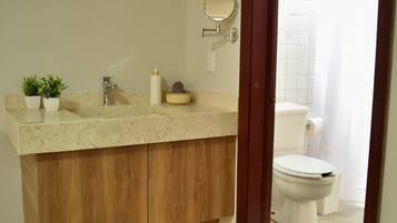 Shower, hair dryer, towels, soap