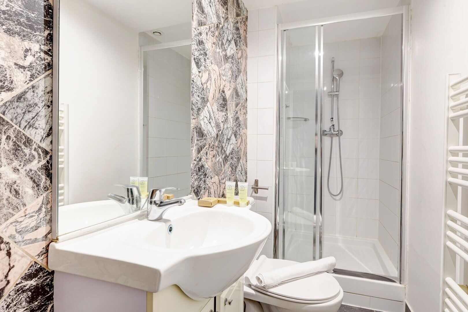 Shower, hair dryer, towels