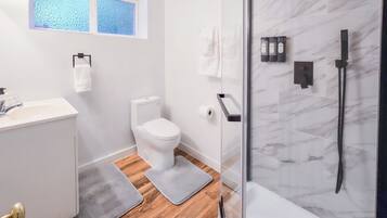 Hair dryer, towels, soap, toilet paper