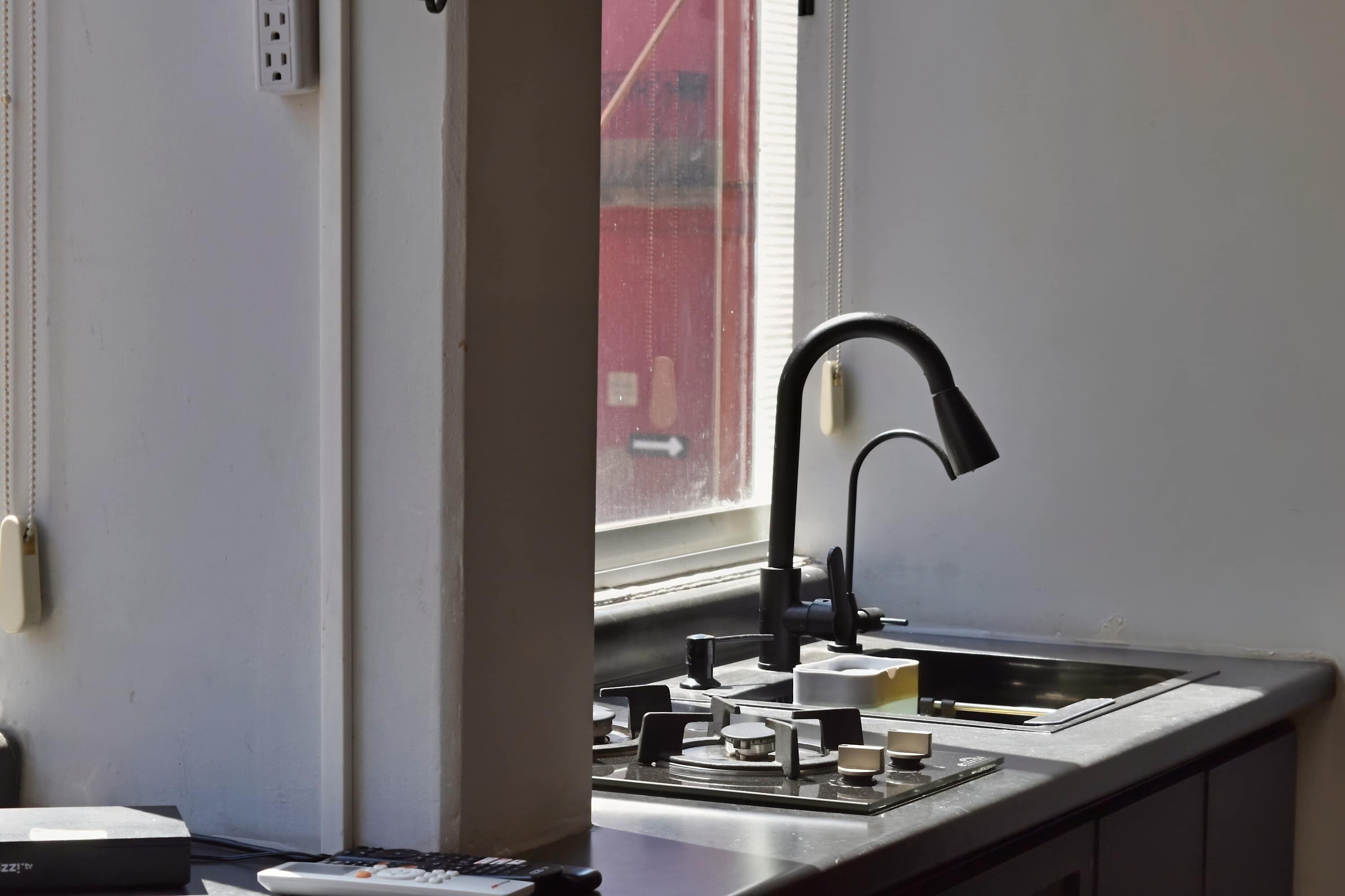 Fridge, microwave, stovetop, coffee/tea maker
