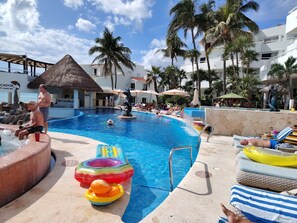 6 outdoor pools, open 9:00 AM to 8:00 PM, pool umbrellas, pool loungers