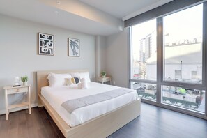 Apartment, City View | 2 bedrooms, premium bedding, blackout drapes, iron/ironing board