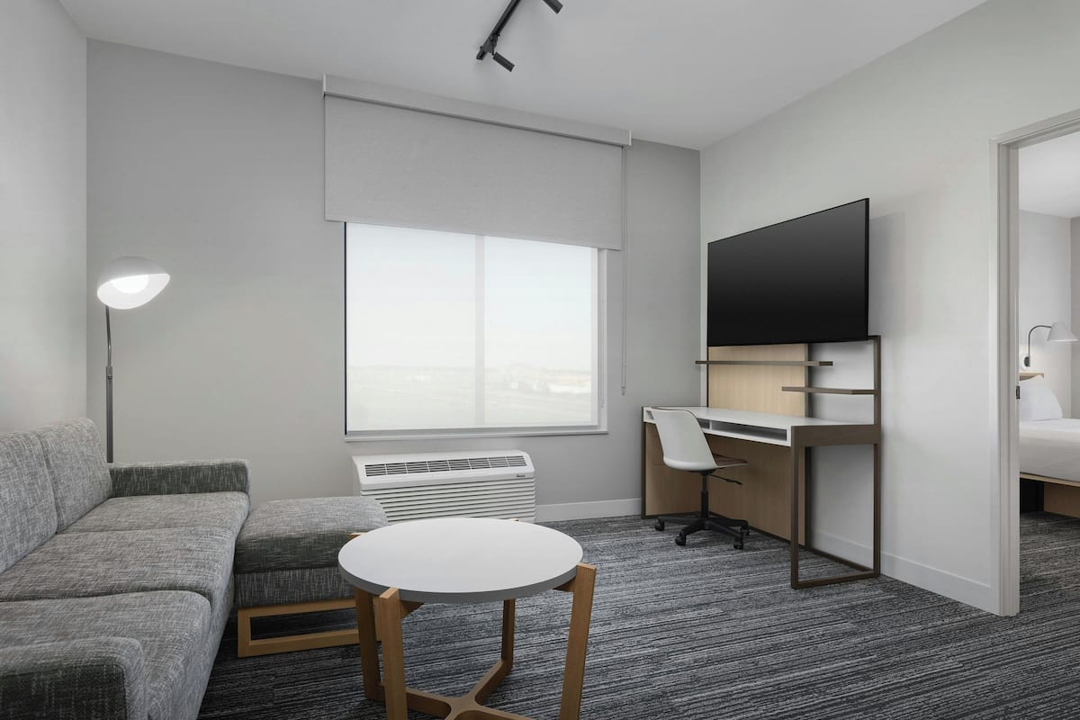 Suite, 1 dormitori | Roba de llit hipoal·lergògena, caixa forta a l'habitació i escriptori