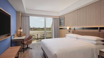 Premium Room, City View (Balcony) | Premium bedding, minibar, in-room safe, desk
