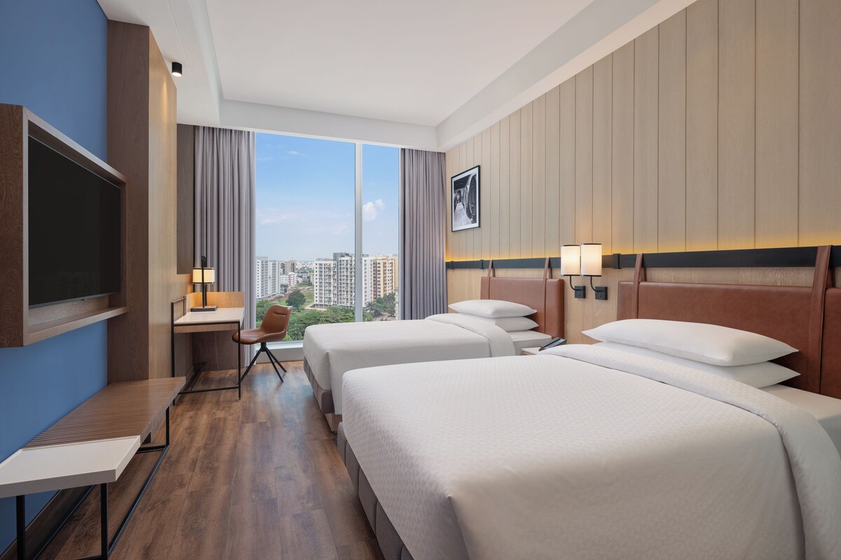 Premium bedding, memory-foam beds, minibar, in-room safe