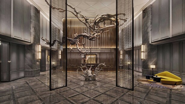 A spacious lobby with a modern chandelier, a central decorative piece, and a yellow seating area. - Le Meridien Nantong (Nantong)