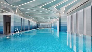 Indoor pool, open 7:00 AM to 10:00 PM, pool umbrellas, pool loungers
