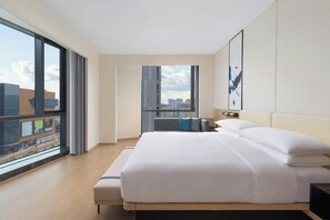 Premium bedding, down duvets, memory-foam beds, in-room safe