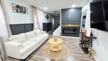 Smart TV, fireplace, foosball, table tennis