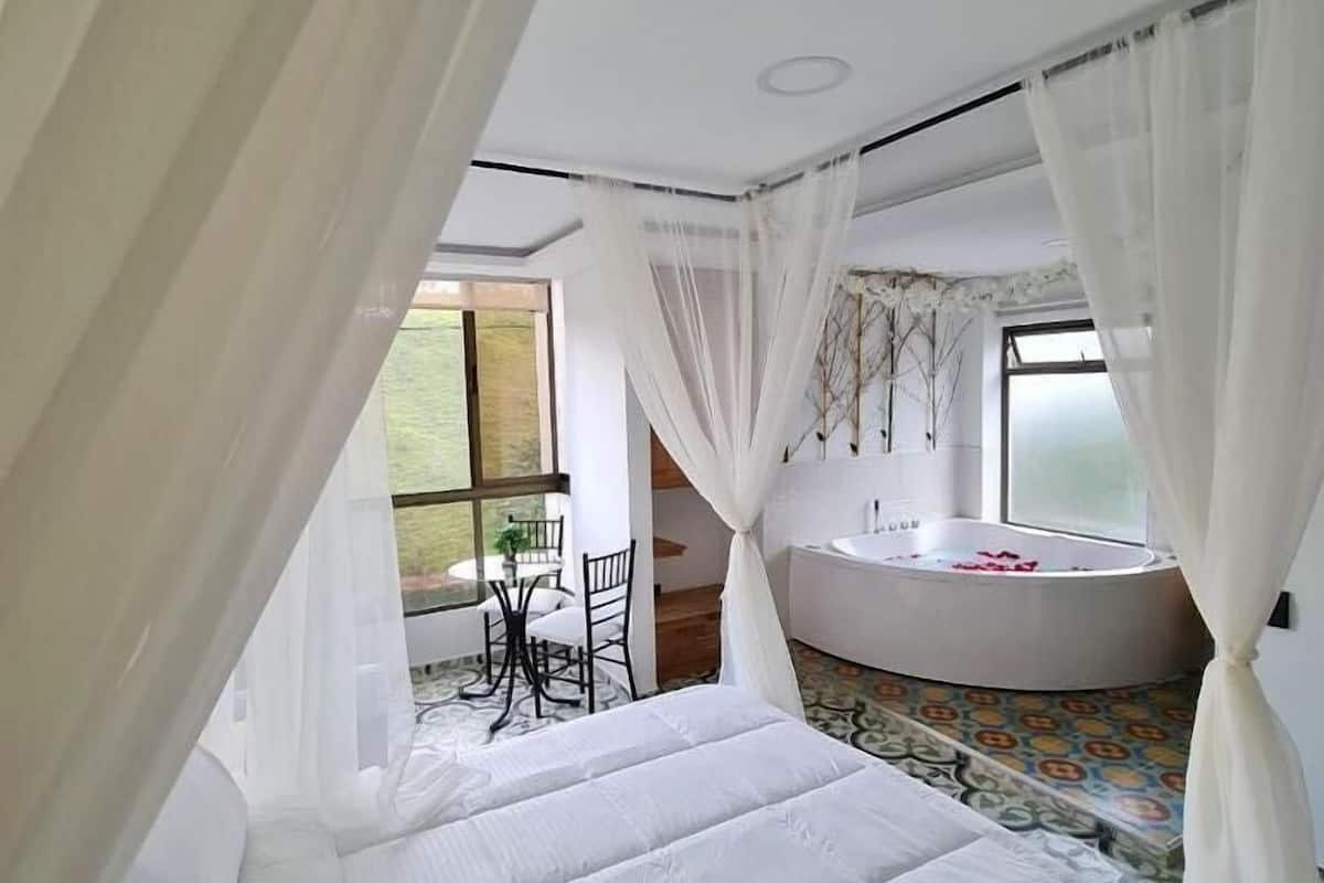 Premium bedding, down comforters, minibar, laptop workspace