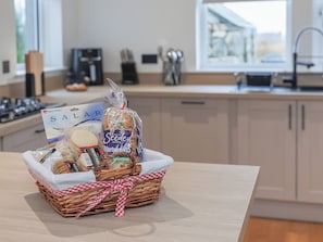 Astianpesukone, syöttötuoli