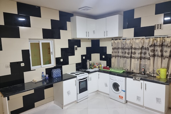 Villa | Private kitchen | Fridge, microwave, oven, stovetop