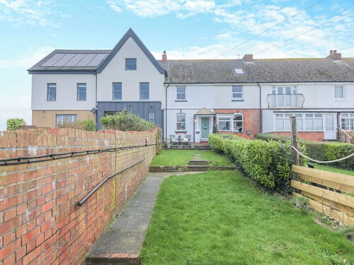 We love this cosy cottage, located just a two minute walk from the beach.
