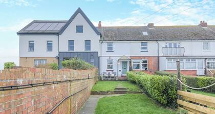 We love this cosy cottage, located just a two minute walk from the beach.