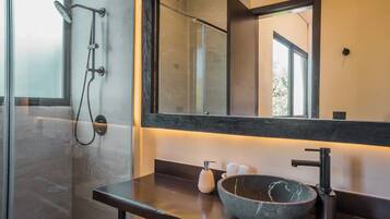 Shower, hair dryer, towels, soap