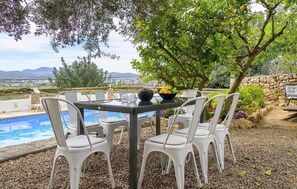 Outdoor dining - Gorgeous home in Sant Antoni de Portman (Sant Antoni de Portman)